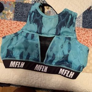 Collar bone protection sports bra